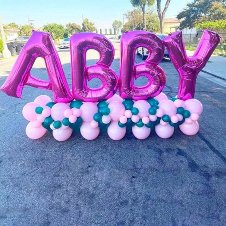 Pink letter balloon